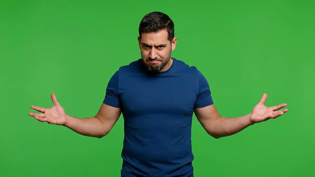 An angry man shrugs with a puzzled expression