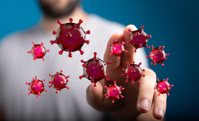 Artistic depiction of a hand interacting with a collection of virus particles, perfect for scientific or healt