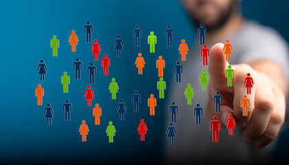 Concept of community, connection, and social networking with diverse colorful people icons. A man pointing at a group of digital people.