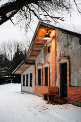 A brick and cement house in winter