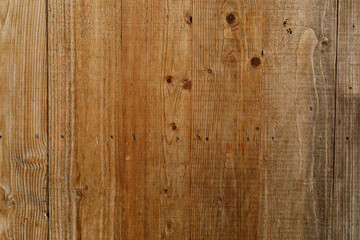 Naklejka premium Close up of old weathered wooden planks, perfect for textures and backgrounds. Ideal for rustic, na