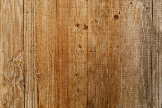 Close-up of wooden planks texture, perfect for backgrounds. Ideal for rustic designs and natural aes