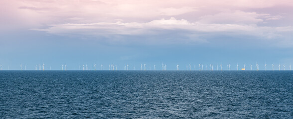 Offshore Wind Farm. Wind Turbines in the North Sea Visible in the Distance © Nancy Pauwels