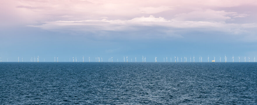 Offshore Wind Farm. Wind Turbines in the North Sea Visible in the Distance