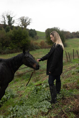 Young Woman with Horse in Autumn Nature