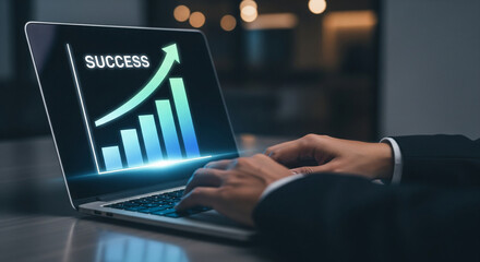 Business professional using laptop with glowing success growth bar chart on screen representing financial progress corporate achievement data analysis and strategic marketing goals performance