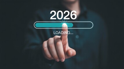 Man interacting with futuristic interface loading 2026