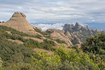 Sunny karst mountain peaks in Montserrat national park, Catalonia, Spain 