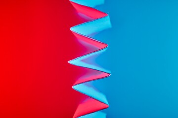 Modern design concept with paper folds and two-tone light.