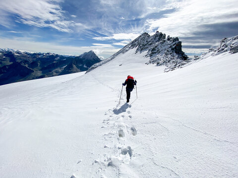 Hiking through the magnificent high mountain landscape with peaks and glaciers of the South Tyrolean Alps in the Antholz Valley near Bruneck, Rieserferner area of ​​the Dolomites, South Tyrol, Italy
