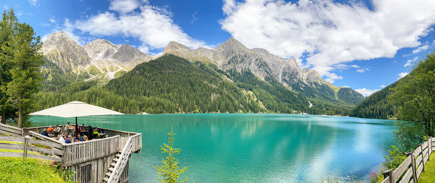 Hiking through the magnificent high mountain landscape with peaks and glaciers of the South Tyrolean Alps in the Antholz Valley near Bruneck, Rieserferner area of ​​the Dolomites, South Tyrol, Italy