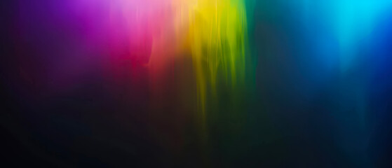 Abstract rainbow light leak creates a soft colorful glow on a dark background, perfect for modern design, digital art, creative layouts, wallpapers, and atmospheric visuals.