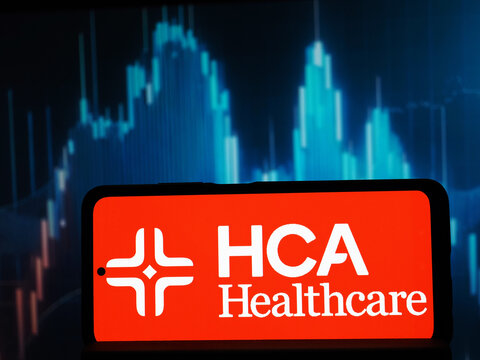 In this photo illustration,  Hospital Corporation of America (HCA Healthcare, Inc.)  logo seen displayed on a smartphone.