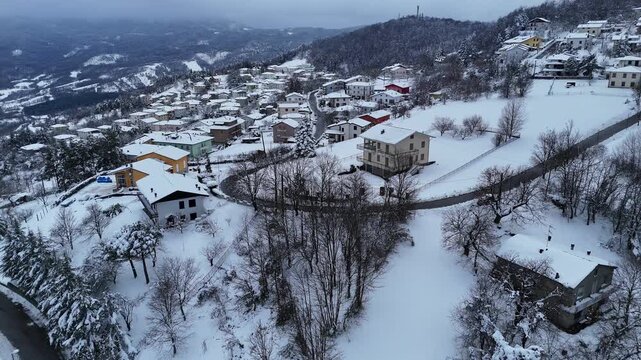 Le Bore village in Parma province covered in winter snow, Italy