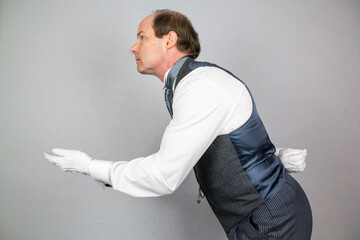 Butler or Hotel Concierge Offering Helping Hand. Professional Hospitality and Courtesy.