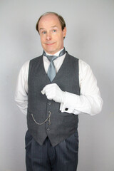 Butler or Hotel Concierge Standing at Polite Attention Eager to be of Service