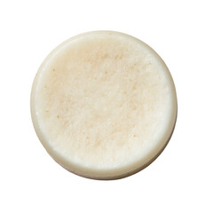 Creamy, light beige substance in a round container, top-down view.  Texture appears granular