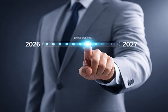 Transition loading 2027 businessman finger touching digital progress bar loading from 2026 to 2027 indicating waiting for new year and future business transition - Powered by Adobe