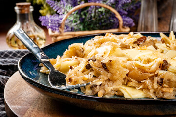 Pasta with sauerkraut and mushrooms.