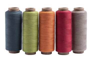 Five spools of colorful thread, close-up