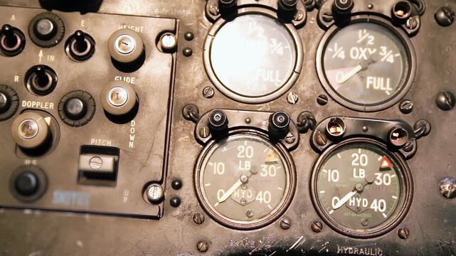 Old Military Aircraft Instrument Panel Emerging From Darkness in Flight - 4K