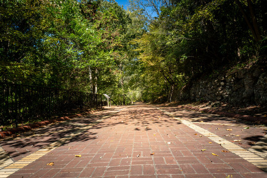 Hot Springs National Park, Arkansas. Grand Promenade, a National Recreation Trail parallel to bathhouse row, behind the bathhouses. Half mile long and made entirely out of brick as a WPA project.