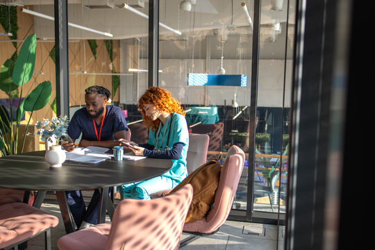 Medical students studying in the cafeteria