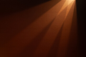 Paper abstraction. Shadows and highlights on brown cardboard. Colored cardboard