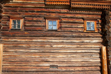 Old Russian Log House with Small Windows