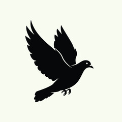 Obraz premium A black bird in flight, wings outstretched, soaring through the air with freedom and agility, a symbol of peace and tranquility