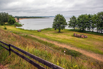 A picturesque eco-trail along a slope on the shore of Lake Peipus. The grounds of the Peski Park Hotel. Zapolye village, Gdovsky District, Pskov Region, Russia.