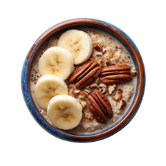 A bowl of oatmeal with sliced bananas and pecans on top isolated on transparent background