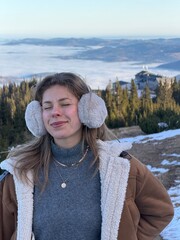 girl on the top of the mountain