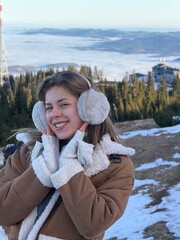 girl on the top of the mountain