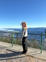 girl on the top of the mountain