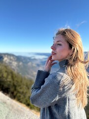 girl on the top of the mountain