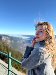 girl on the top of the mountain