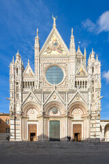 Siena Cathedral (Duomo di Siena), a medieval marble church with Gothic facade and bell tower, located in Siena, Tuscany, Italy.
