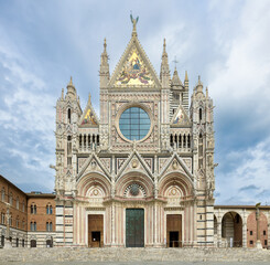 Siena Cathedral (Duomo di Siena), a medieval marble church with Gothic facade and bell tower, located in Siena, Tuscany, Italy.