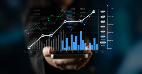 A person holding a smartphone displaying vibrant data visualizations, including growth charts and graphs, emphasizing financial trends and analytics in business. Scalp