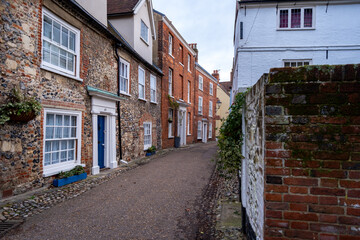 Row of historic and traditional houses in Cathedral Close in the city of Norwich