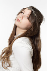 Portrait of a beautiful young girl with jewelry