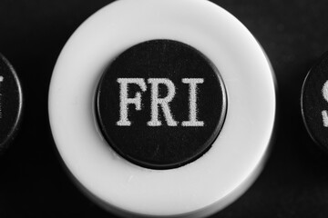 Abbreviated designation day week on calendar in close up, Friday.