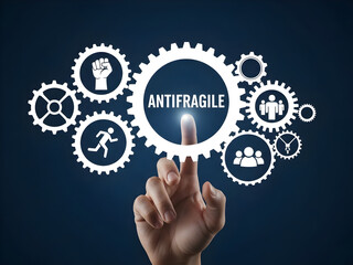 Business hand touching anti-fragile concept with interconnected gears representing system security and operational resilience