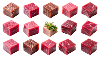 Cubed cuts of raw meat arranged in a grid, one with herbs