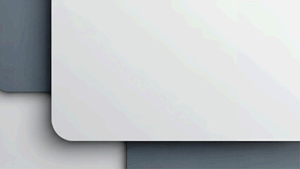 A serene landscape of a vast mountain range under a clear blue sky with a winding road and lush green trees