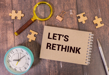 Let's Rethink text button on keyboard, concept background.