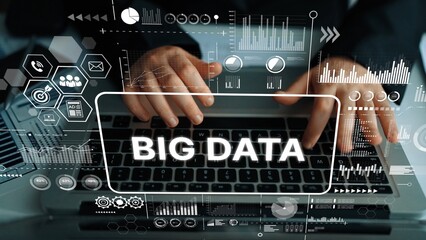 Close-up of Hands Typing on Keyboard Surrounded by Digital Big Data Analytics and Graphical User Interface Elements. Asymptotic smart data analytic.