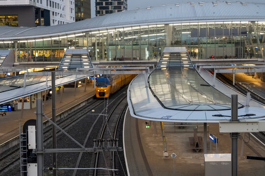 Urban view, transportation in the Netherlands, railroad and modern construstion of railway station