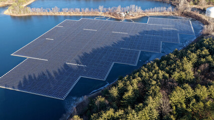 Aerial View of Floating Solar Panel Array on Freshwater Reservoir in New Jersey